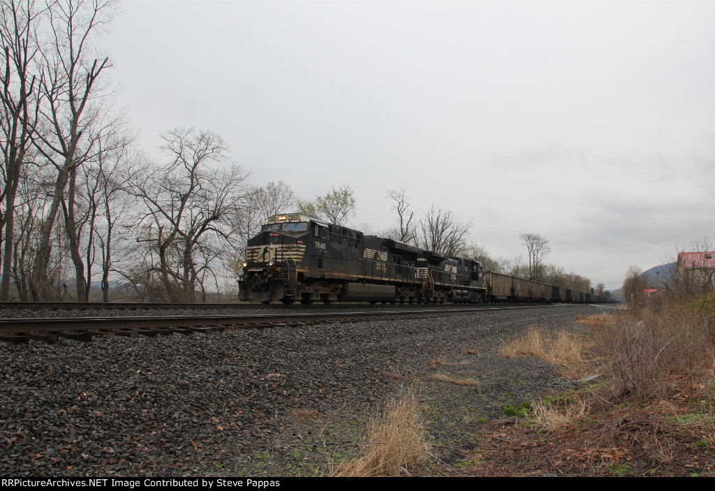 NS 7648 and 4858 leading train 597 through Cove PA